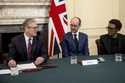 British Prime Minister Keir Starmer, left, holds a roundtable meeting with writer Jack Thorne, cent…