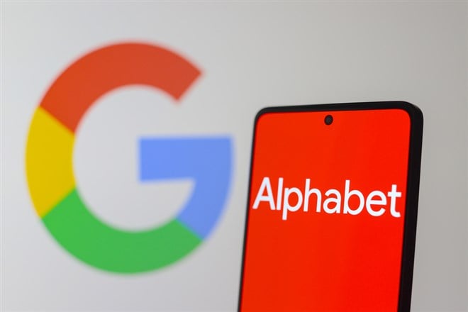 July 24, 2024, Paraguay. In this photo illustration, the Alphabet Inc. logo seen displayed on a smartphone screen and the Google logo in the background