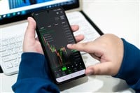 Child business analyze financial graphs stock market concept with technology