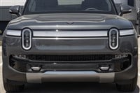Indianapolis - Circa April 2023: Rivian R1S EV Electric Vehicle display at a dealership. Rivian offers the R1S in Adventure and Launch models.
